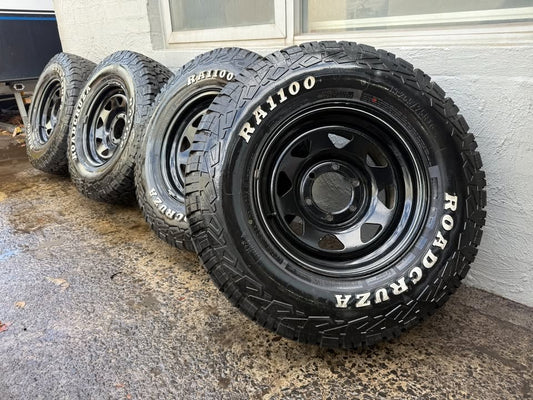 32" A/T Tyres on Black 6 Stud Steel Rims