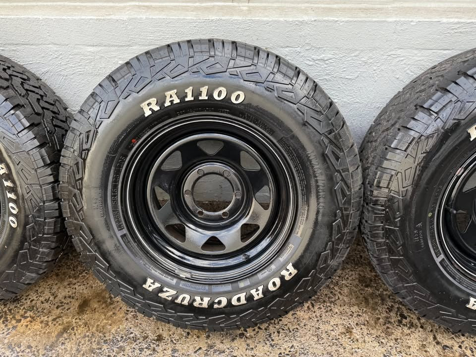 32" A/T Tyres on Black 6 Stud Steel Rims