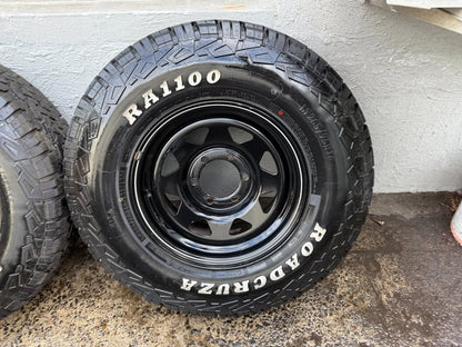 32" A/T Tyres on Black 6 Stud Steel Rims