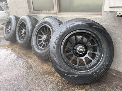 OX 6 Stud Black Alloy Wheels with All Terrain Tyres
